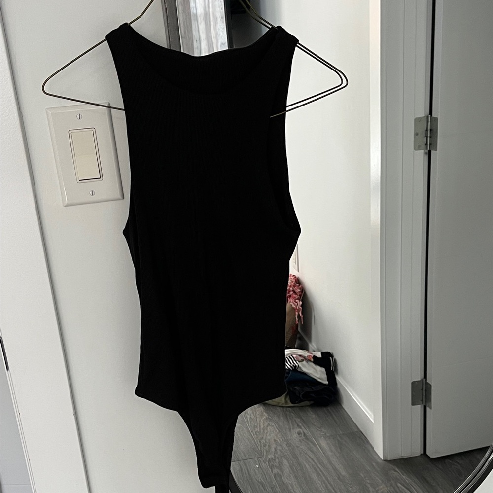 Black ribbed body suit. New. XS/S